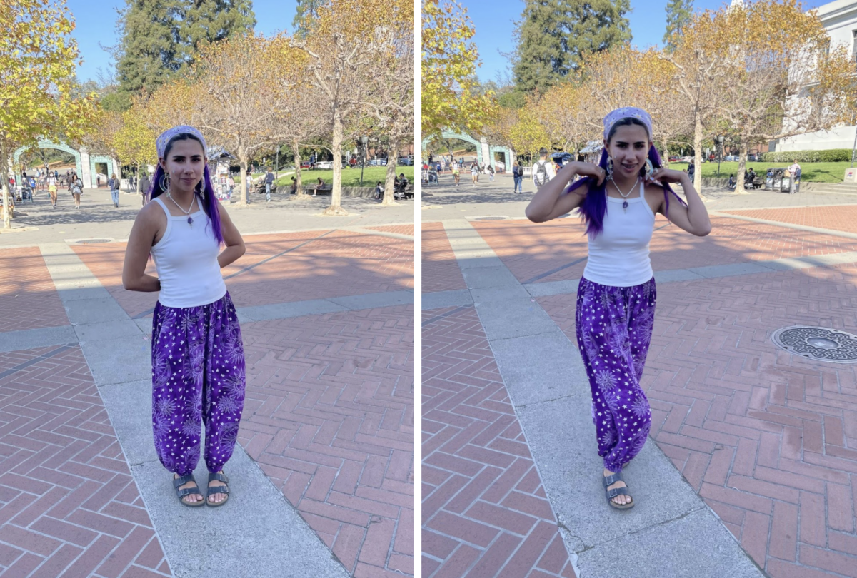 A student in purple pants with purple hair. 